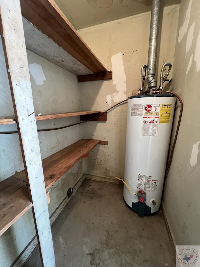 utility room featuring gas water heater