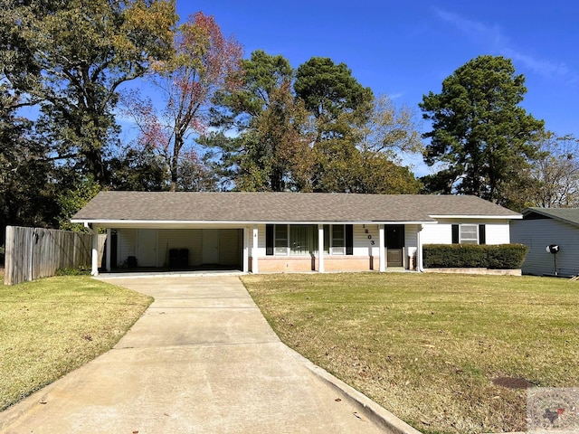 single story home with a front yard and a carport