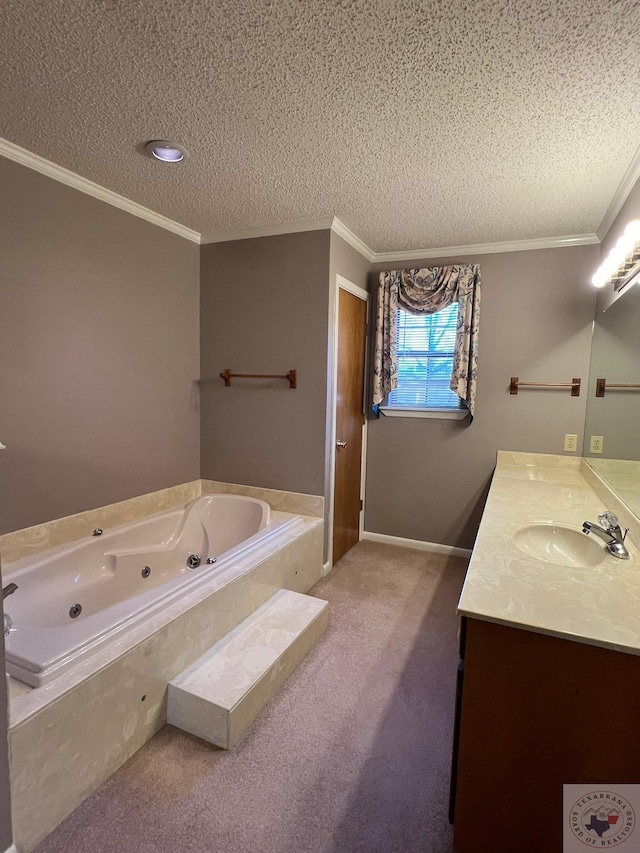 bathroom with vanity, a washtub, ornamental molding, and a textured ceiling