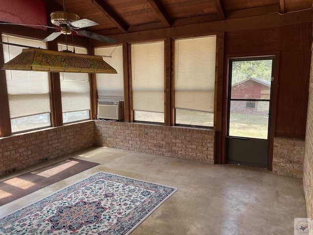 unfurnished sunroom with cooling unit, beamed ceiling, ceiling fan, and wood ceiling