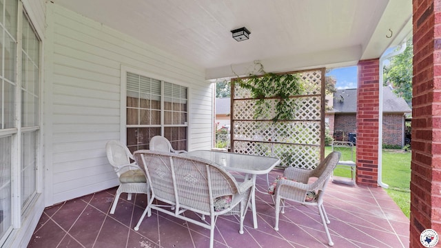 5906 Winchester Dr, Texarkana, TX 75503 - view of patio featuring outdoor dining space