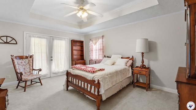 5906 Winchester Dr, Texarkana, TX 75503 - bedroom with a tray ceiling, access to outside, crown molding, light carpet, and ceiling fan