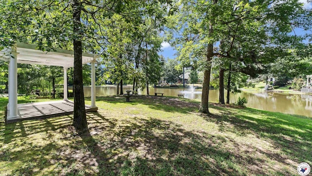 5906 Winchester Dr, Texarkana, TX 75503 - view of grassy yard with a water view and view of scattered trees