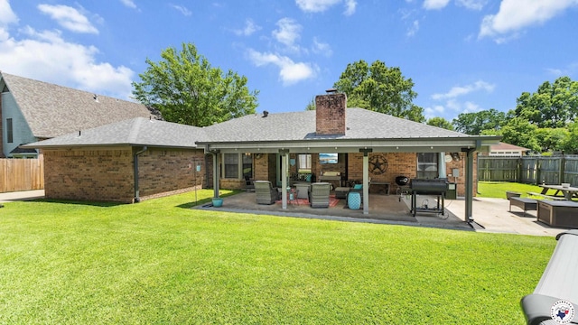 509 Brown Dr, Wake Village, TX 75501 - rear view of house featuring brick siding, a patio, a shingled roof, and a chimney