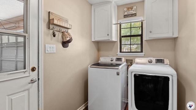 509 Brown Dr, Wake Village, TX 75501 - laundry area featuring independent washer and dryer and cabinet space