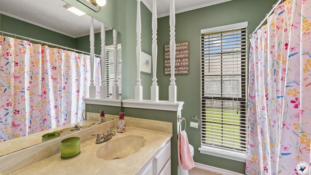 509 Brown Dr, Wake Village, TX 75501 - full bathroom featuring vanity, ornamental molding, a shower with curtain, and a textured ceiling