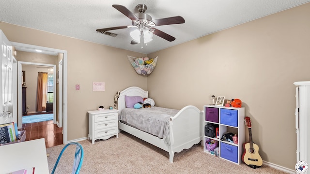 509 Brown Dr, Wake Village, TX 75501 - bedroom with carpet floors and a ceiling fan