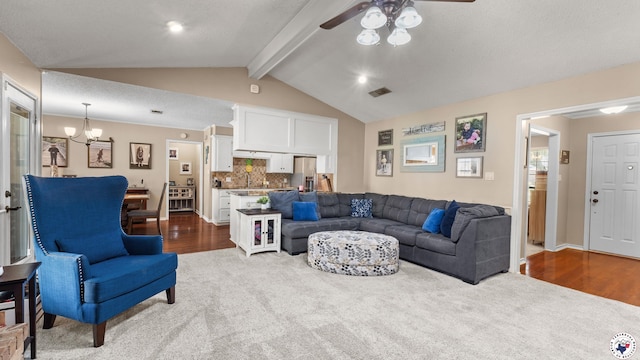 509 Brown Dr, Wake Village, TX 75501 - living room featuring a ceiling fan, dark wood finished floors, a chandelier, and dark carpet