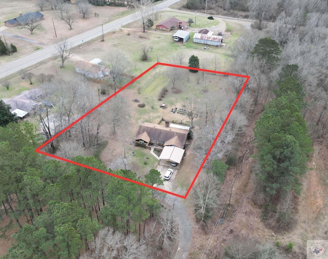 birds eye view of property featuring a rural view