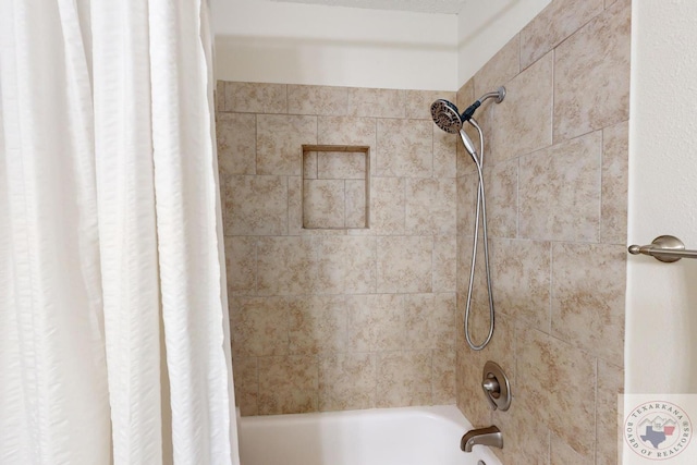 bathroom featuring shower / bath combo