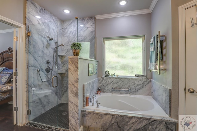 bathroom featuring separate shower and tub and ornamental molding