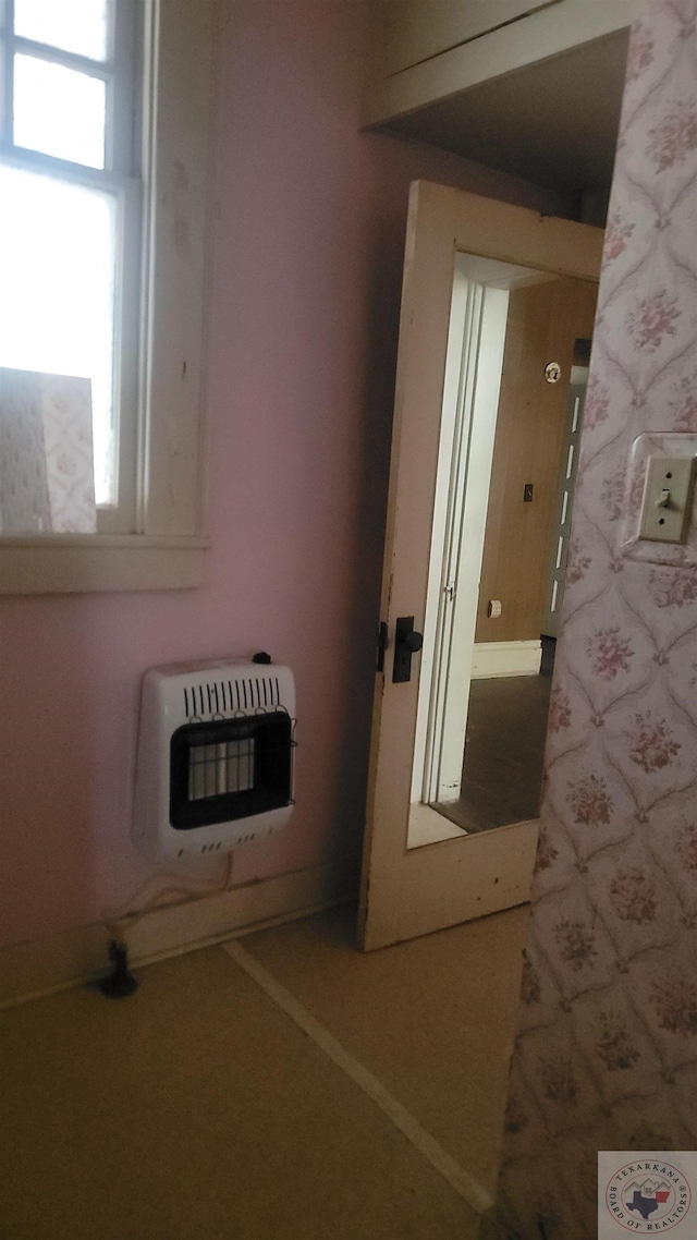 doorway to outside with heating unit