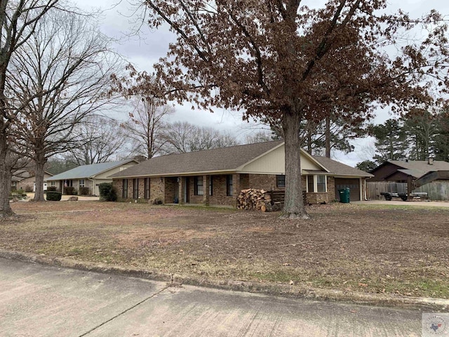 ranch-style home with brick siding