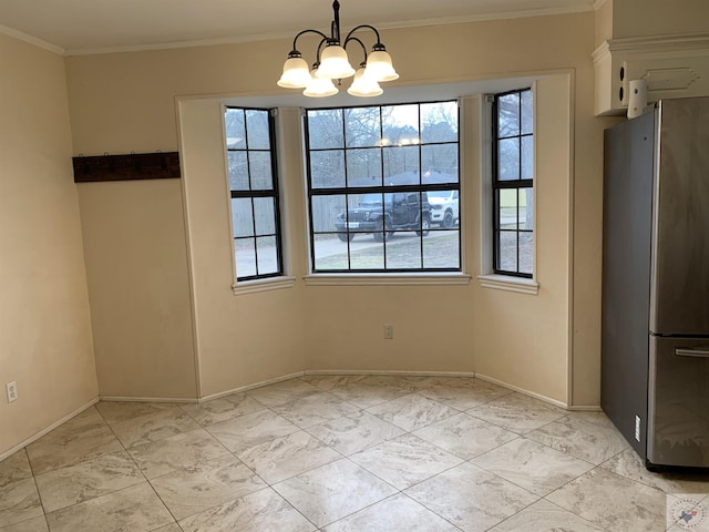 unfurnished dining area with a healthy amount of sunlight, marble finish floor, an inviting chandelier, and ornamental molding