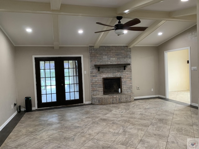 unfurnished living room with french doors, lofted ceiling with beams, baseboards, and a brick fireplace