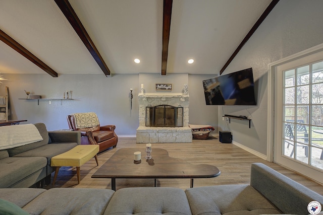 3009 Crestridge Dr, Texarkana, TX 75503 - living area with baseboards, wood finished floors, beamed ceiling, and a fireplace
