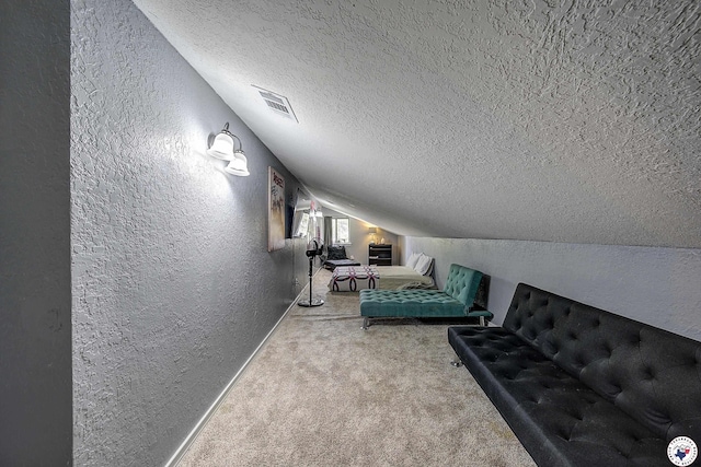 3009 Crestridge Dr, Texarkana, TX 75503 - living area featuring a textured wall, carpet floors, visible vents, and a textured ceiling