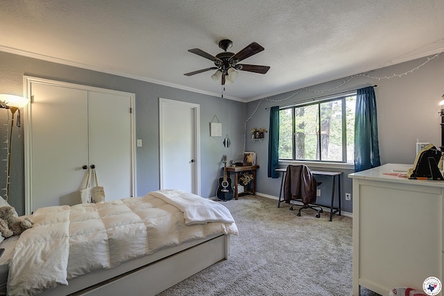 3009 Crestridge Dr, Texarkana, TX 75503 - bedroom with a ceiling fan, crown molding, a textured ceiling, light colored carpet, and baseboards