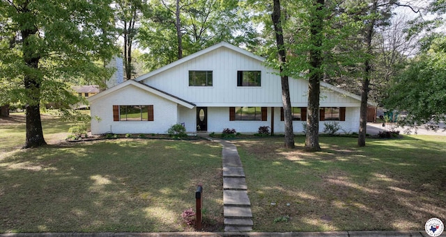 3009 Crestridge Dr, Texarkana, TX 75503 - modern farmhouse style home with covered porch, brick siding, and a front yard