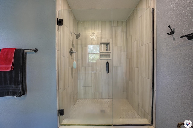 3009 Crestridge Dr, Texarkana, TX 75503 - full bathroom with a textured wall and a stall shower
