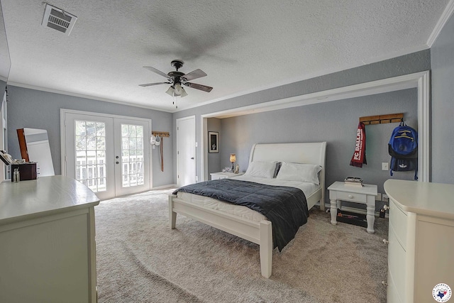 3009 Crestridge Dr, Texarkana, TX 75503 - bedroom featuring visible vents, access to exterior, french doors, a textured ceiling, and light colored carpet