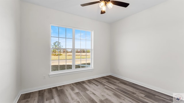 unfurnished room featuring hardwood / wood-style flooring and ceiling fan