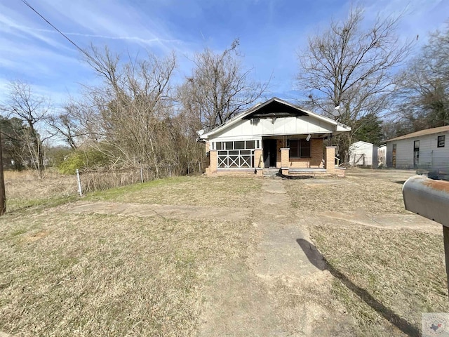 exterior space featuring a front yard