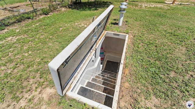 955 County Road 1124, Linden, TX 75563 - entry to storm shelter with a lawn