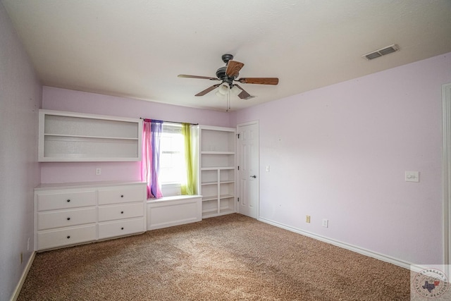 unfurnished bedroom with ceiling fan and carpet floors