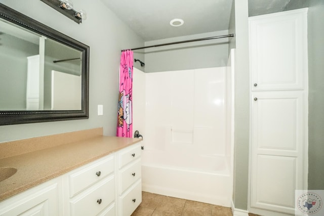 bathroom featuring vanity, tile patterned floors, and shower / bathtub combination with curtain