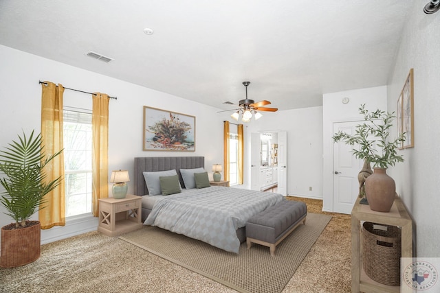 carpeted bedroom with ceiling fan