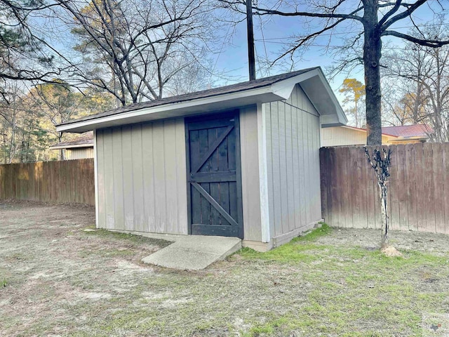 view of outdoor structure with a lawn