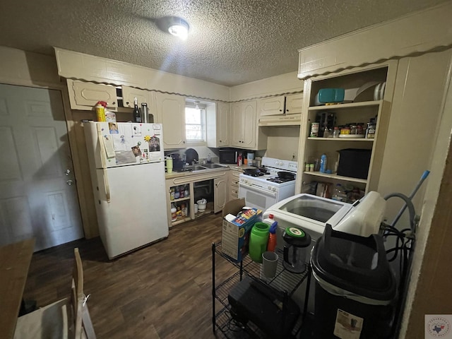 kitchen with white cabinetry, white appliances, dark wood-type flooring, and a textured ceiling