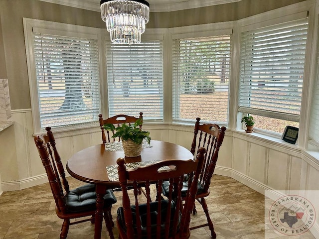 dining room featuring plenty of natural light and a chandelier