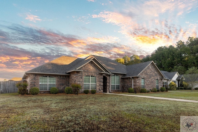 view of front of home featuring a lawn