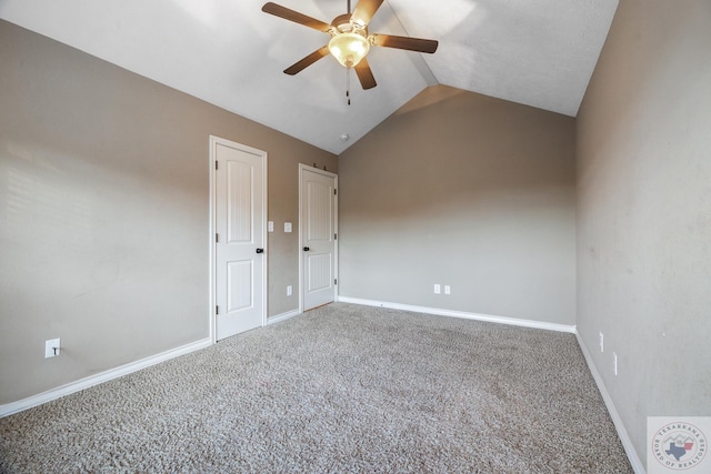 unfurnished room with carpet floors, lofted ceiling, and ceiling fan