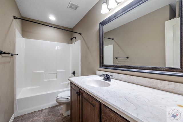 full bathroom featuring vanity, toilet, and  shower combination