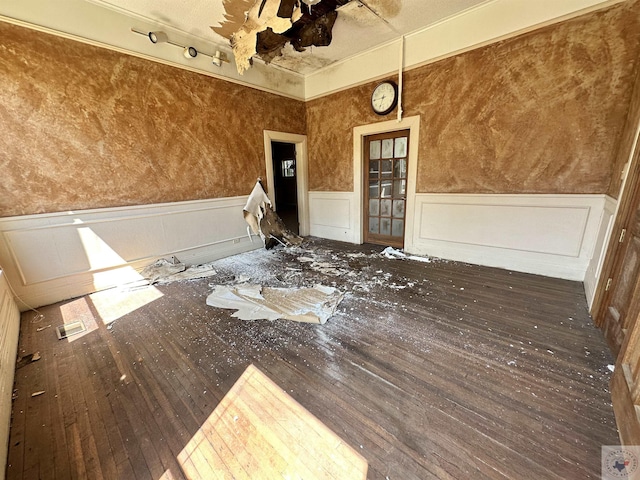 unfurnished room featuring dark hardwood / wood-style floors