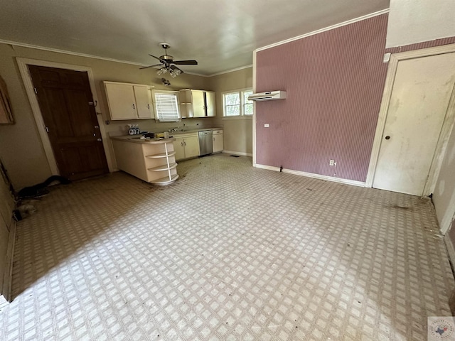 kitchen with dishwasher, ceiling fan, crown molding, and cream cabinets