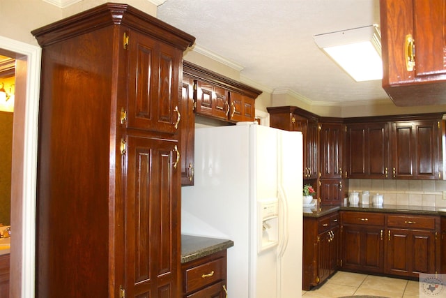 kitchen featuring white fridge with ice dispenser, backsplash, ornamental molding, and light tile patterned floors