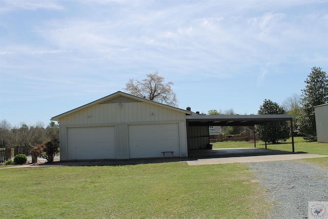 garage featuring a yard