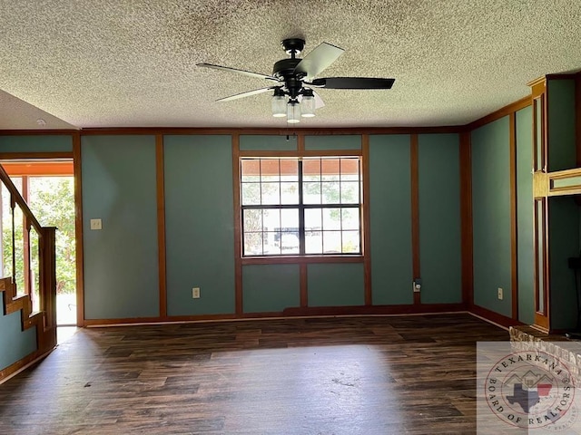 unfurnished room featuring ceiling fan and dark hardwood / wood-style flooring