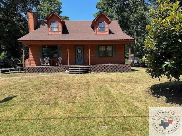 view of front facade with covered porch and a front yard