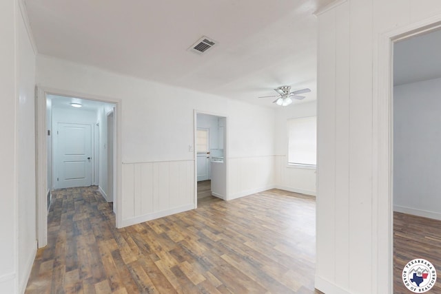 2451 Oaklawn Dr, Texarkana, TX 75501 - unfurnished bedroom with ceiling fan, visible vents, and wood finished floors