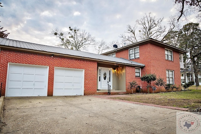 view of front of home featuring a garage