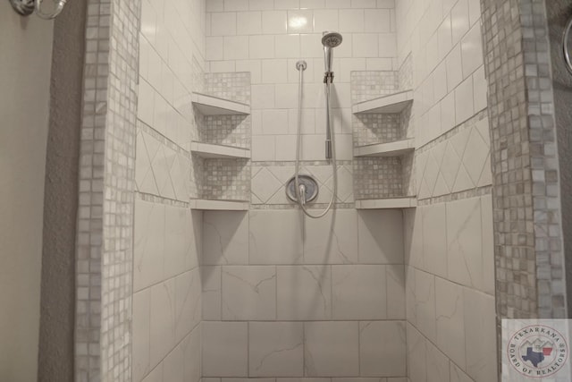 room details with a tile shower