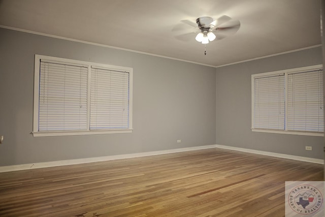 spare room featuring ceiling fan, ornamental molding, and light hardwood / wood-style floors