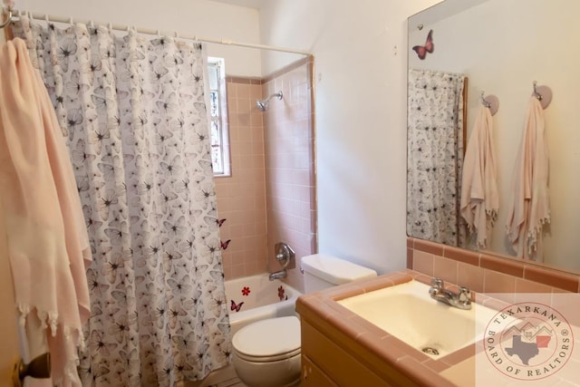 full bathroom with vanity, toilet, shower / bath combo with shower curtain, and decorative backsplash