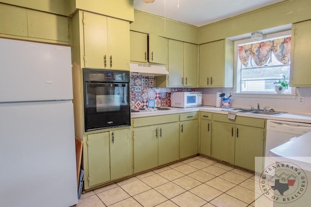 kitchen with decorative backsplash, sink, white appliances, and light tile patterned flooring