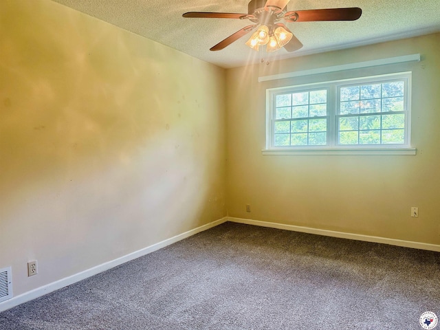 5 Arnold Dr, Texarkana, AR 71854 - carpeted empty room featuring a textured ceiling and a ceiling fan